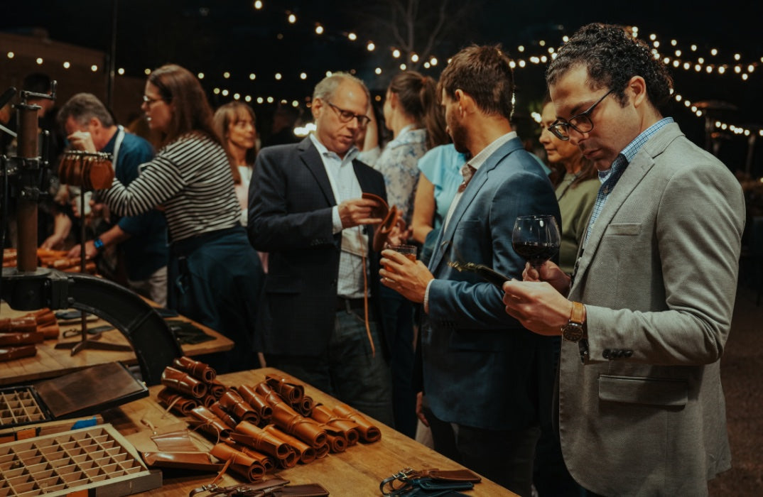 Guests at a live Lifetime Leather fire-branding corporate event